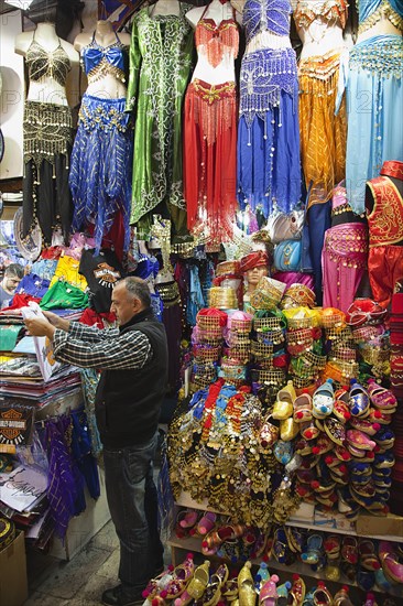 Turkey, Istanbul, Fatih, Sultanahmet, Kapalicarsi, Stall selling traditional clothing in the Grand Bazaar. 
Photo Stephen Rafferty