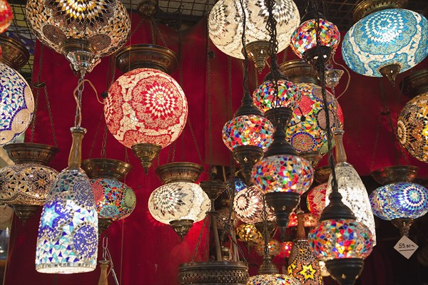 Turkey, Istanbul, Fatih, Sultanahmet, Kapalicarsi, Display of ornate coloured glass lamps in the Grand Bazaar. 
Photo Stephen Rafferty