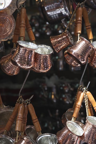 Turkey, Istanbul, Fatih, Eminou, Misir Carsisi, Copper pots for sale outside the Spice Market. 
Photo Stephen Rafferty