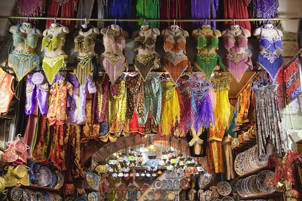 Turkey, Istanbul, Fatih, Eminou, Misir Carsisi, Display of traditional clothes in the Spice market. 
Photo Stephen Rafferty