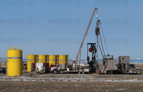 Canada, Alberta, Granum, Argosy Energy Inc fracking for tight shale oil in a wheat field at the edge of the Bakken Play. 
Photo Trevor Page