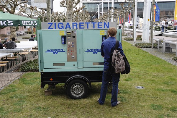 Germany, Hessen, Fankfurt, Mobile cigarette machine parked in the grounds of the Musik Messe trade show.