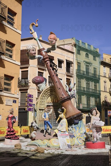Spain, Valencia Province, Valencia, Falla scene with Papier Mache figures in the streets of the Carmen district during Las Fallas festival. 
Photo Hugh Rooney