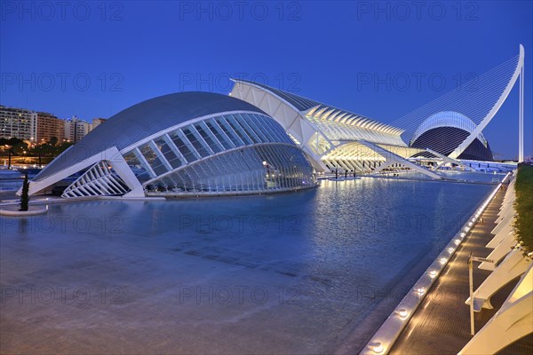 Spain, Valencia Province, Valencia, Spain, Valencia Province, Valencia, La Ciudad de las Artes y las Ciencias, City of Arts and Sciences, Overall vista of the complex of buildings at dusk. 
Photo Hugh Rooney