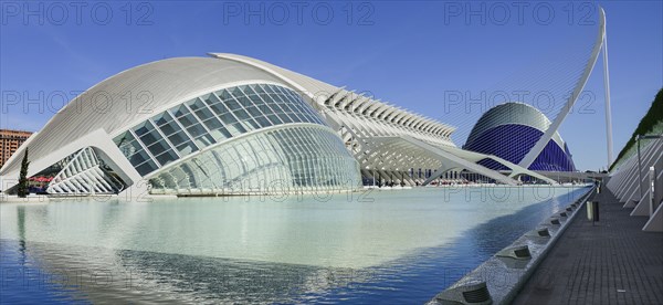 Spain, Valencia Province, Valencia, Spain, Valencia Province, Valencia, La Ciudad de las Artes y las Ciencias, City of Arts and Sciences, L'Hemisferic, Principe Felipe Science Museum, El Pont de l'Assut de l'Or Bridge and Agora. 
Photo Hugh Rooney