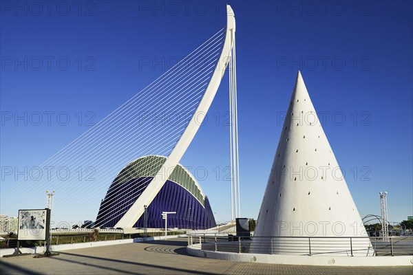 Spain, Valencia Province, Valencia, La Ciudad de las Artes y las Ciencias  City of Arts and Sciences El Pont de lAssut de lOr Bridge and Agora with lift from Umbracle car park in foreground.