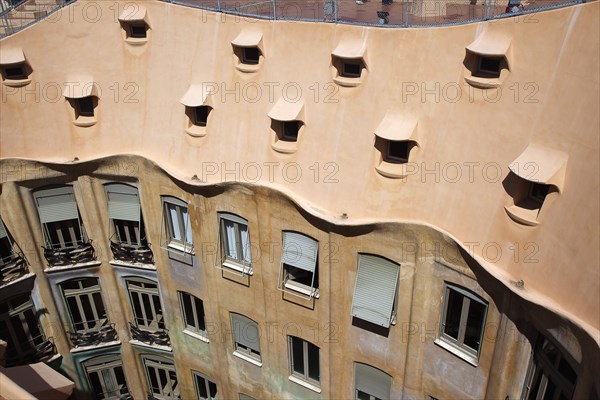 Spain, Catalonia, Barcelona, La Pedrera or Casa Mila on Passeig de Gracia, designed by Antoni Gaudi. 
Photo Stephen Rafferty