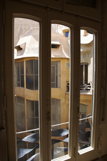 Spain, Catalonia, Barcelona, La Pedrera or Casa Mila on Passeig de Gracia, designed by Antoni Gaudi, window detail in the Apartment. 
Photo Stephen Rafferty