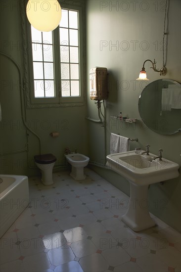 Spain, Catalonia, Barcelona, La Pedrera or Casa Mila on Passeig de Gracia, designed by Antoni Gaudi, inside the The Apartment bathroom. 
Photo Stephen Rafferty