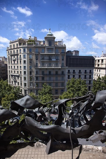 Spain, Catalonia, Barcelona, La Pedrera or Casa Mila on Passeig de Gracia, designed by Antoni Gaudi, apartment balcony with steel railing in shape of seeweed. 
Photo Stephen Rafferty