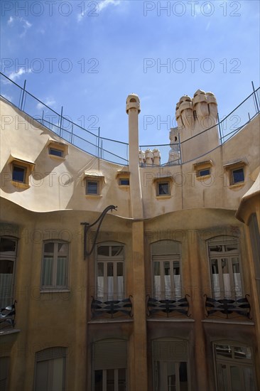 Spain, Catalonia, Barcelona, La Pedrera or Casa Mila on Passeig de Gracia, designed by Antoni Gaudi. 
Photo Stephen Rafferty