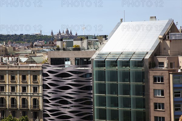 Spain, Catalonia, Barcelona, Spain, Catalonia, Barcelona, Example, view over modern office buidlings toward Montjuic. 
Photo Stephen Rafferty
