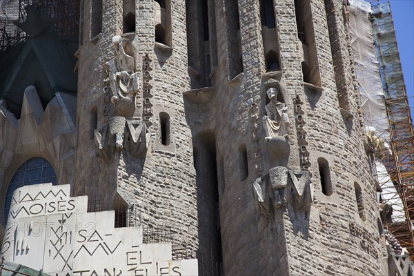 Spain, Catalonia, Barcelona, Eixample  exterior of La Sagrada Familia  designed by Antoni Gaudi.