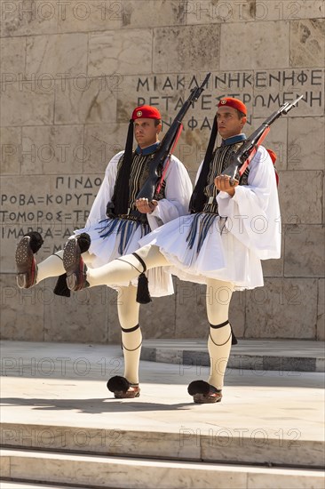 Greece, Attica, Athens, Greek soldiers, Evzones, marching beside Tomb of the Unknown Soldier, outside Parliament building. 
Photo Mel Longhurst