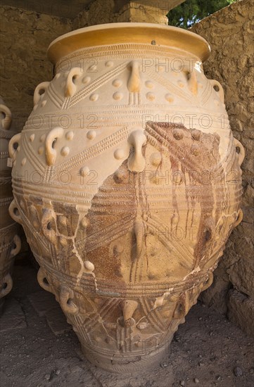 Greece, Crete, Knossos, A Pithos, large storage jar, in The Magazines of The Giants, Knossos Palace. 
Photo Mel Longhurst