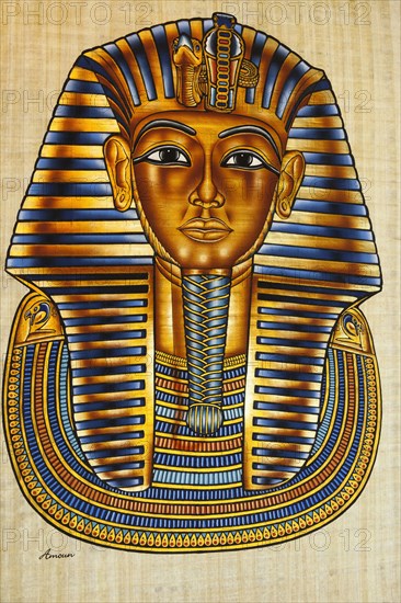 Egypt, Cairo, Painting of Tutankhamun's death mask on papyrus paper. 
Photo Mel Longhurst