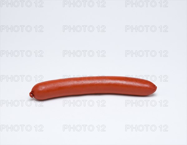 Food, Cooked, Meat, Single saveloy on a white background.