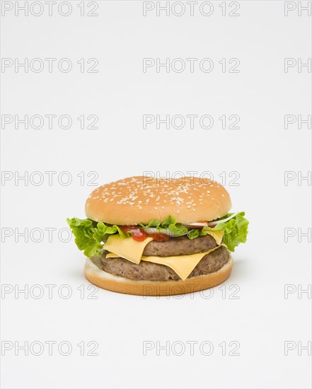 Food, Cooked, Meat, Double cheesburger with salad in a bun on a white background.