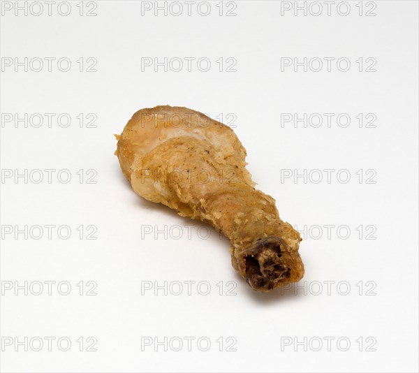 Food, Cooked, Poultry, single battered chicken drumsticks on a white background.