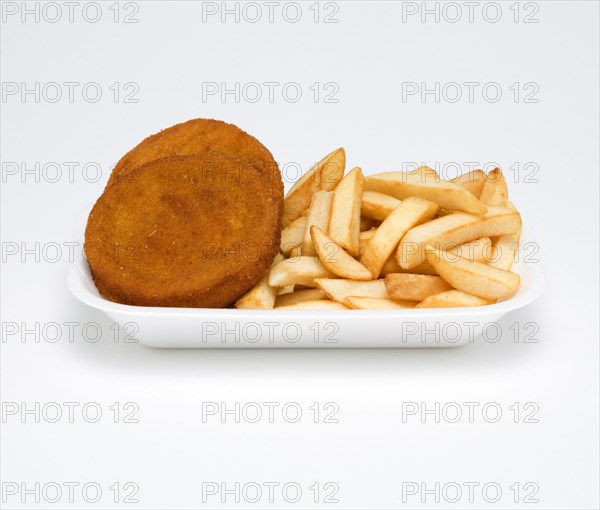 Food, Cooked, Fish, Two fishcakes with potato chips in a foam polystyrene tray on a white background.