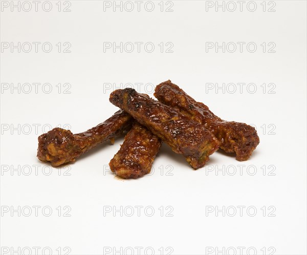 Food, Cooked, Meat, Sticky pork ribs on a white background.