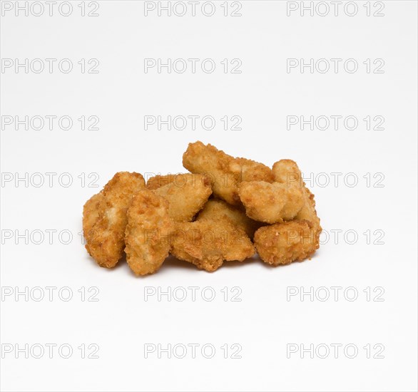 Food, Cooked, Fish, Battered scampi on a white background.