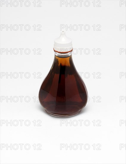 Food, Condiment, Vinegar, A bottle of malt vinegar on a white background.