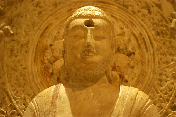 Bouddha Amida assis