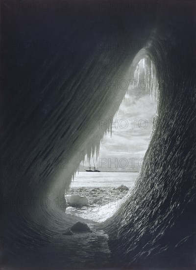 Ponting, A Cavern in an Iceberg