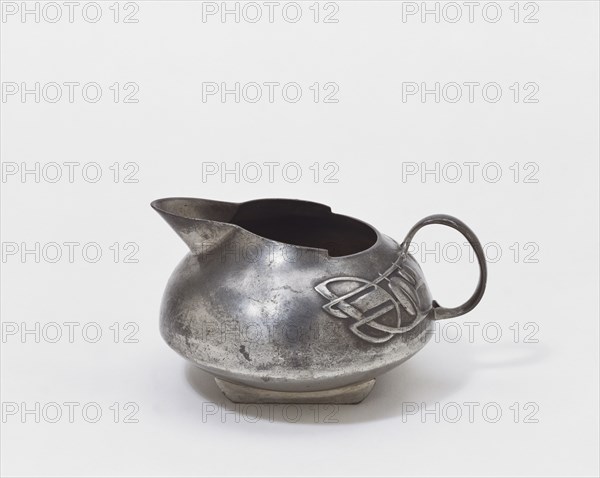 Pewter Tudric Milk Jug, by Archibald Knox. London, England, early 20th century