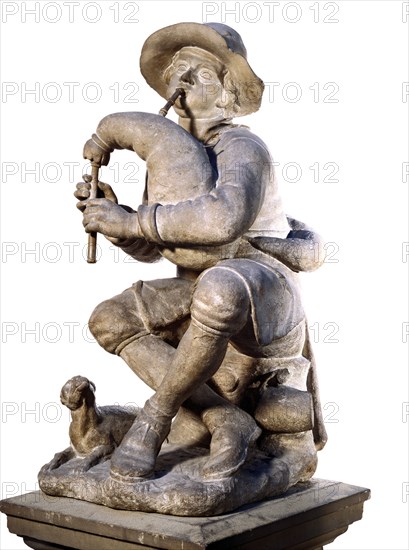 Boy playing the bagpipes, by Caius Gabriel Cibber. England, late 17th century