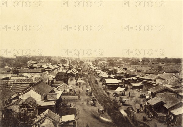 View of a street in the Tartar city taken from Ha-Ta-Men, near Peking (China)