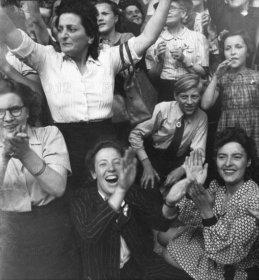 Scene of cheering crowd during the Liberation of Paris (August 1944)