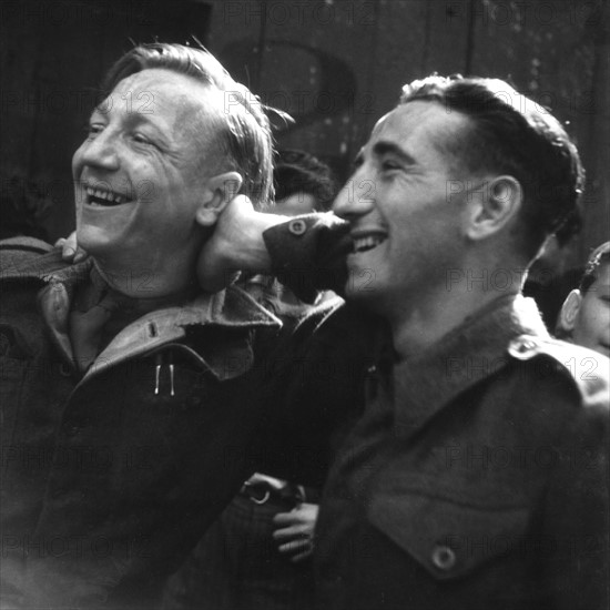 Scene of cheering people during the Liberation of Paris (August 1944)