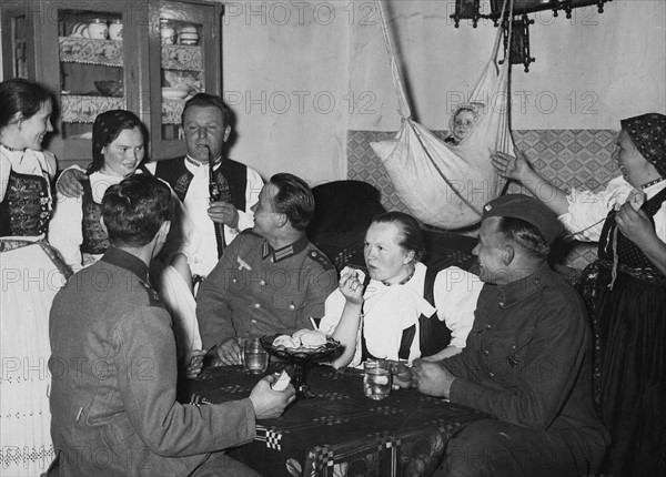 Friendship scene between German soldiers and the population of Bohemia and Moravia (1939)