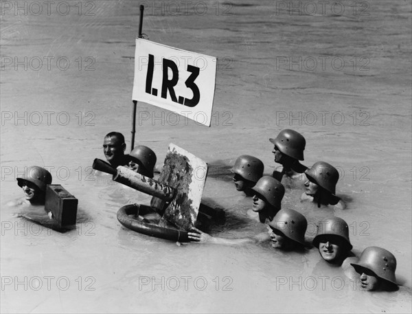 German soldiers carrying out a sporting performance on the Danube River, Germany