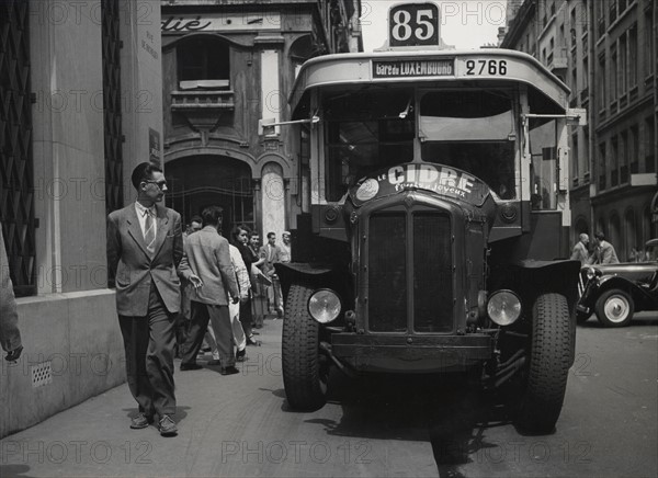 Bus driving on the pavement