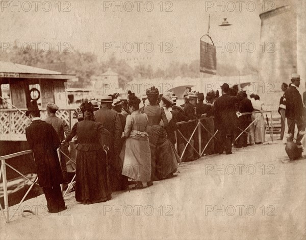 Atget, Men and women on the Seine River in Paris