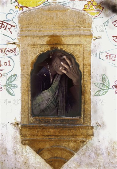 Rajasthani woman in window