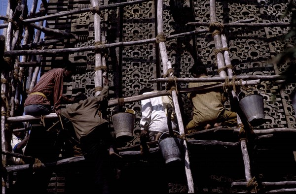 Restoration and cleaning of Adinatha Temple walls, Khajuraho, India