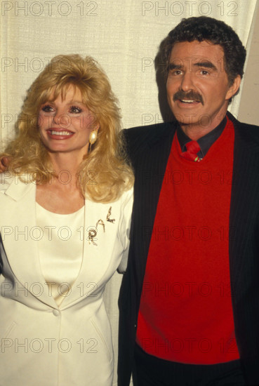 BURT REYNOLDS with LONI ANDERSON in 1992. (Credit Image: © Globe Photos/ZUMAPRESS.com)